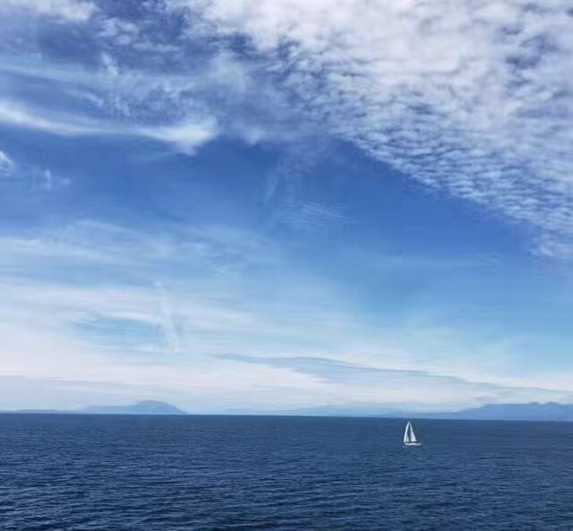 Sailing along the Strait of Georgia in the dog days of summer...