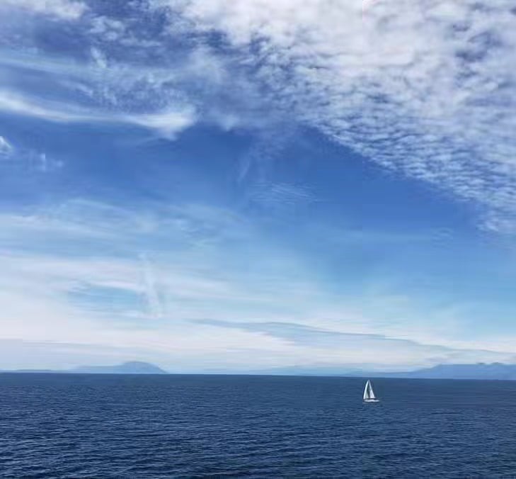 Sailing along the Strait of Georgia in the dog days of summer...